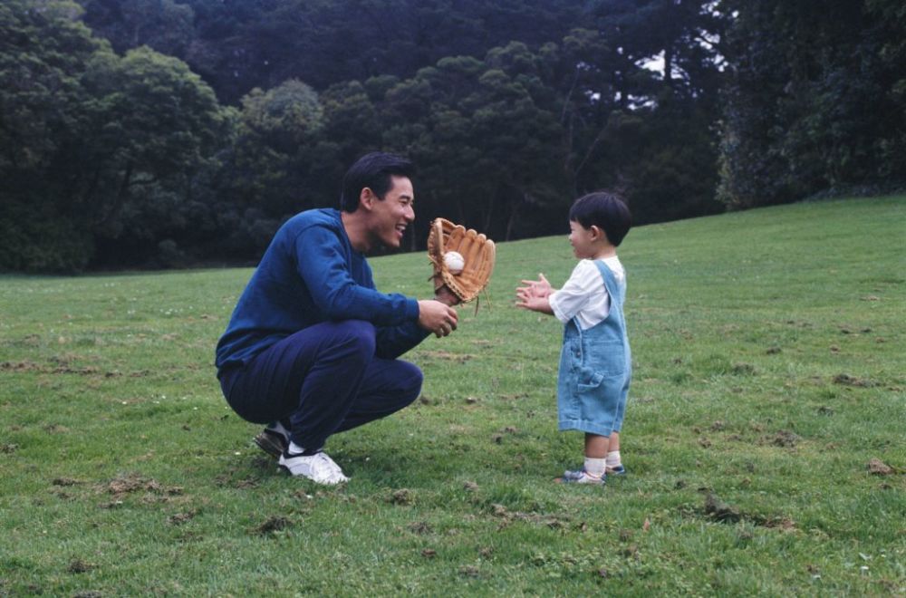 Father and Son Playing Catch