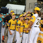 pirates player fist bumping se team mlb ll classic