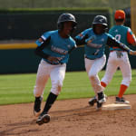 caribbean players rounding second