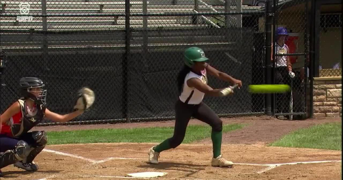 Julia Wisk throws out runner Little League