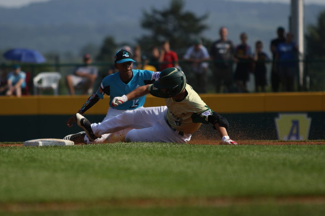 ap player sliding into second