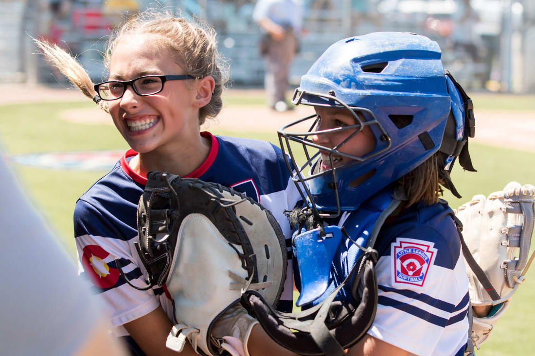 two girls celebrating and hugging