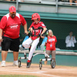 challenger game - player in wheelchair heading to first