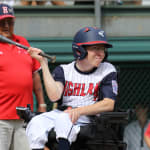challenger game - player in wheelchair hitting ball