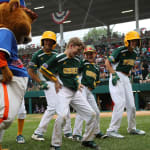 midwest team dancing with dugout
