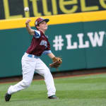 new england player throwing ball