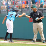 latin america player and coach high fiving