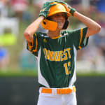 midwest player with hands on head