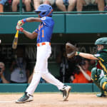 great lakes player hitting ball