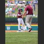 new england coach and player shaking hands