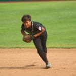 softball player throwing ball
