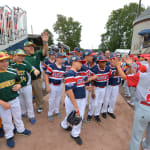 ll players high fiving each other
