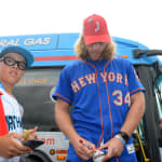 mets player signing autographs for ll players