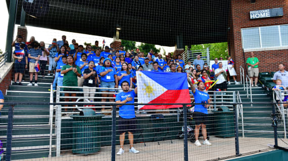 Fans of Team Asia-Pacific Sing their Anthem