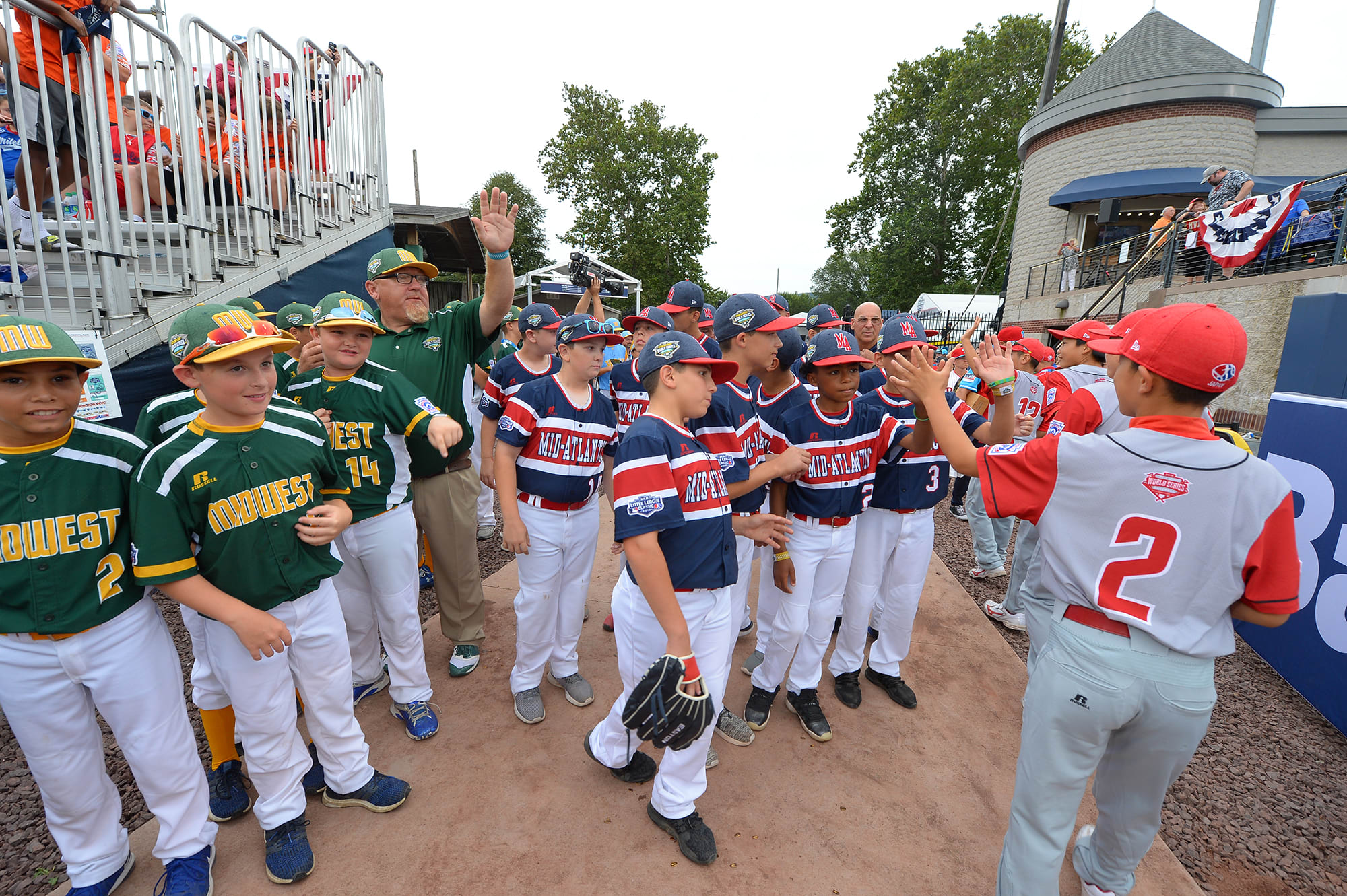 ll players high fiving each other