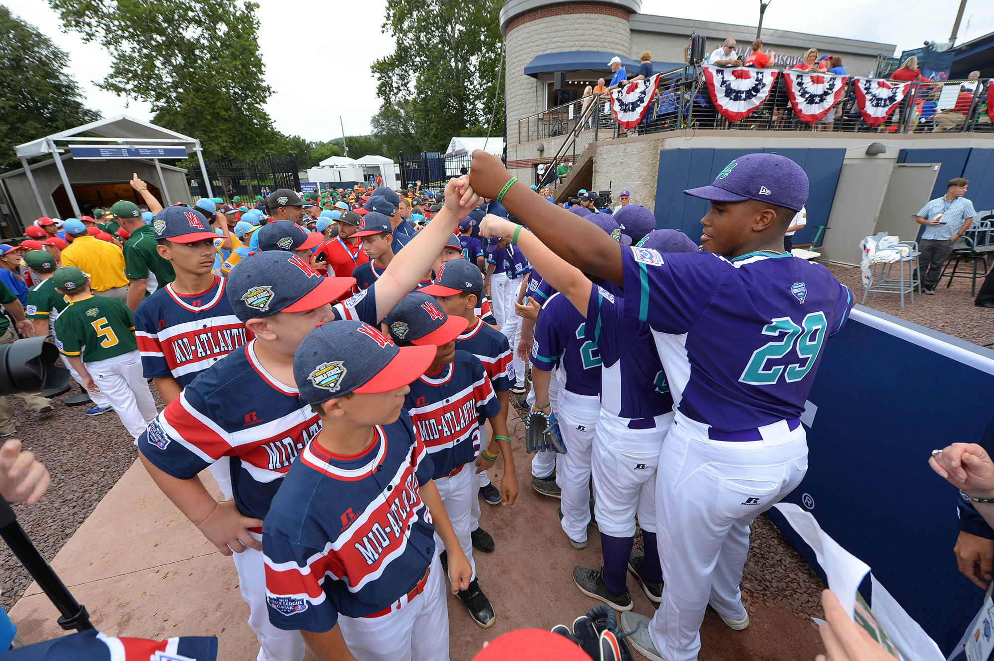 ll players high fiving each other