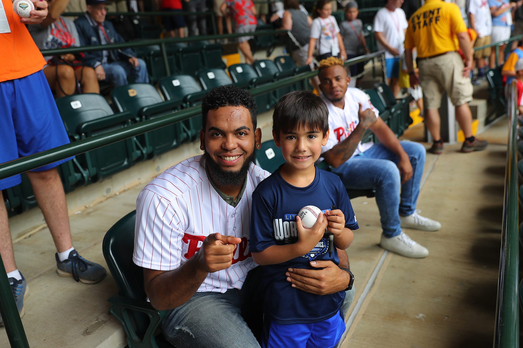 phillies player and fan smiling