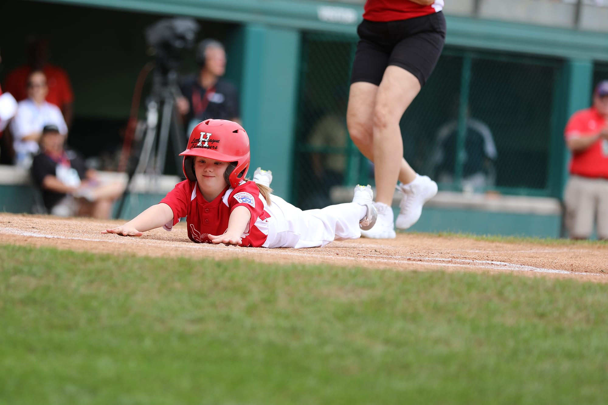 challenger game - player sliding into homeplate