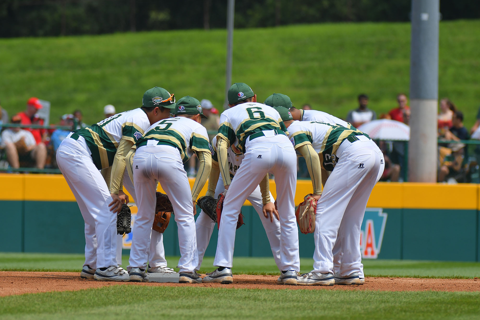 asia-pacific team huddle