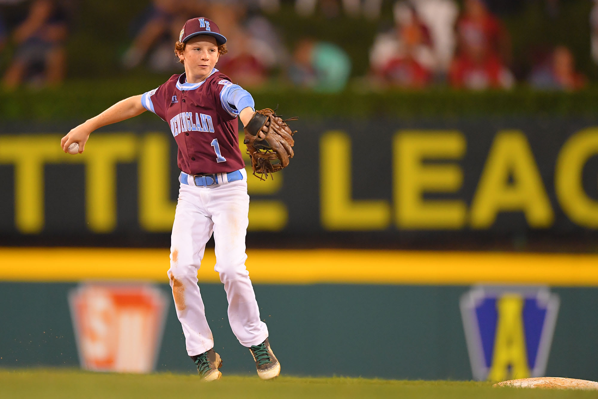 NE outfield throwing to base