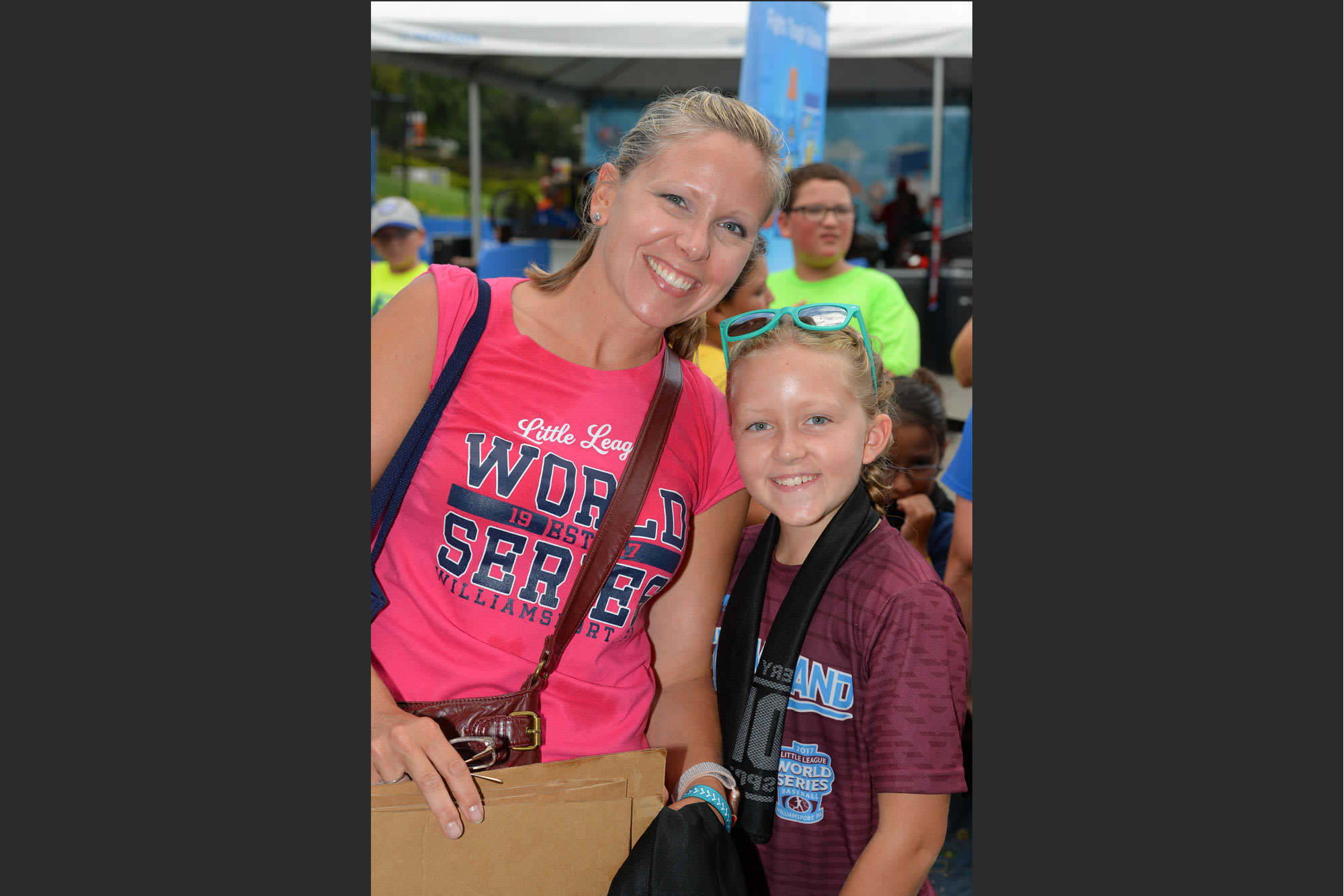 mom and daughter smiling