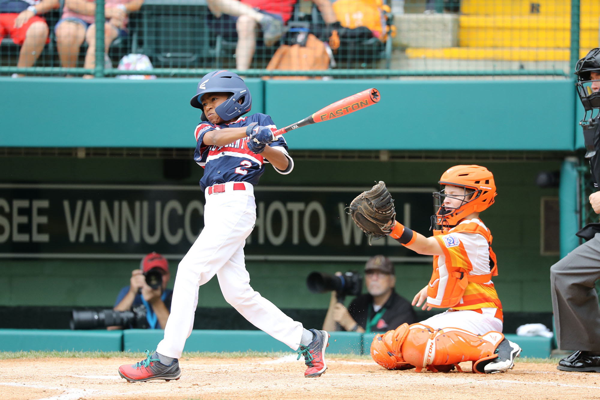 mid-atlantic player swinging bat