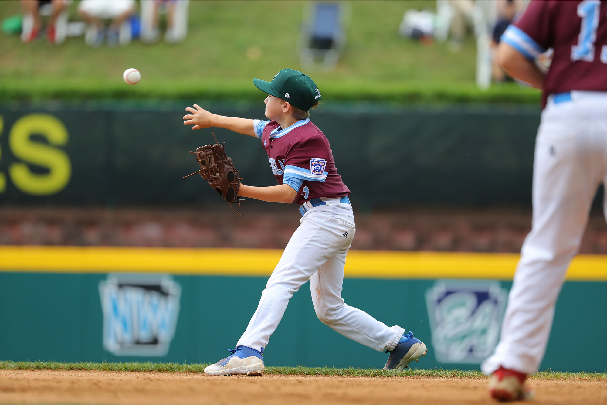 new england player throwing ball