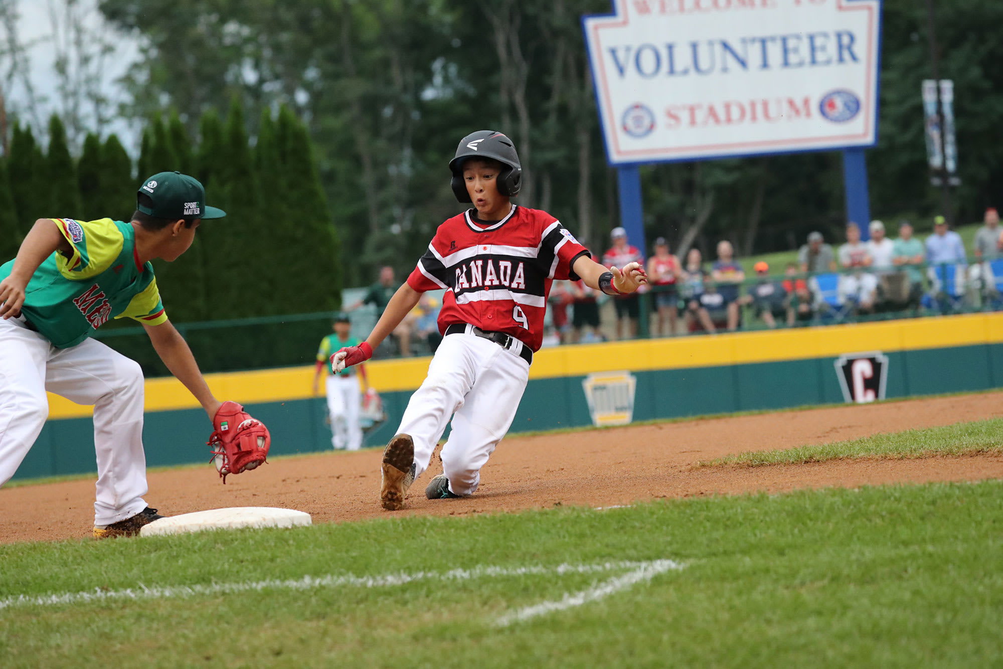 canada player sliding third