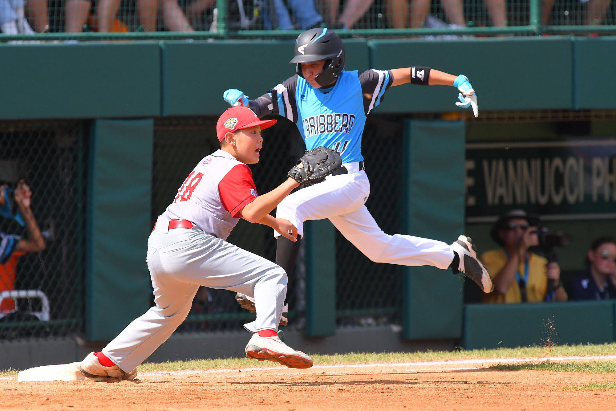 caribbean player running to first