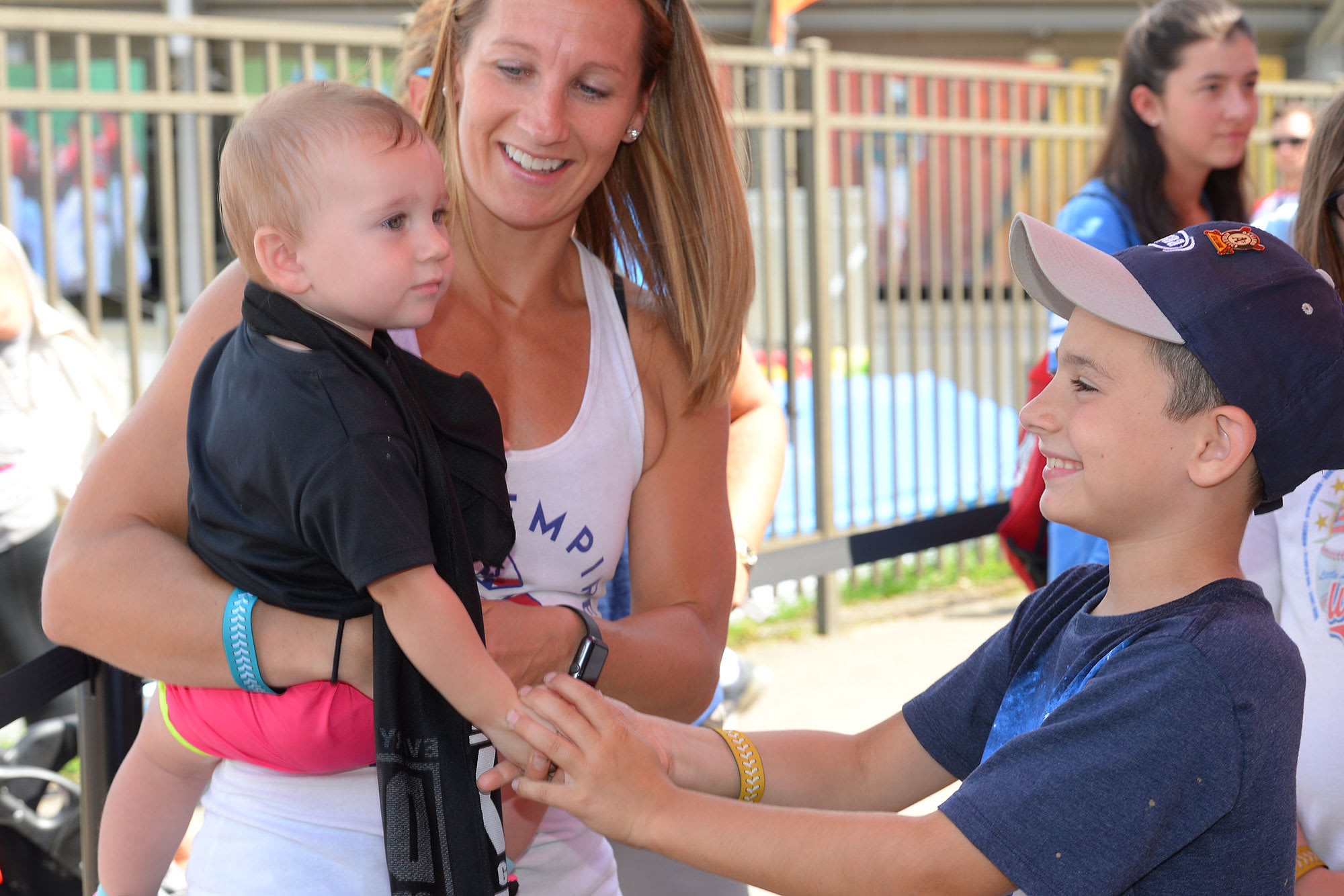 mom holding baby family fun zone