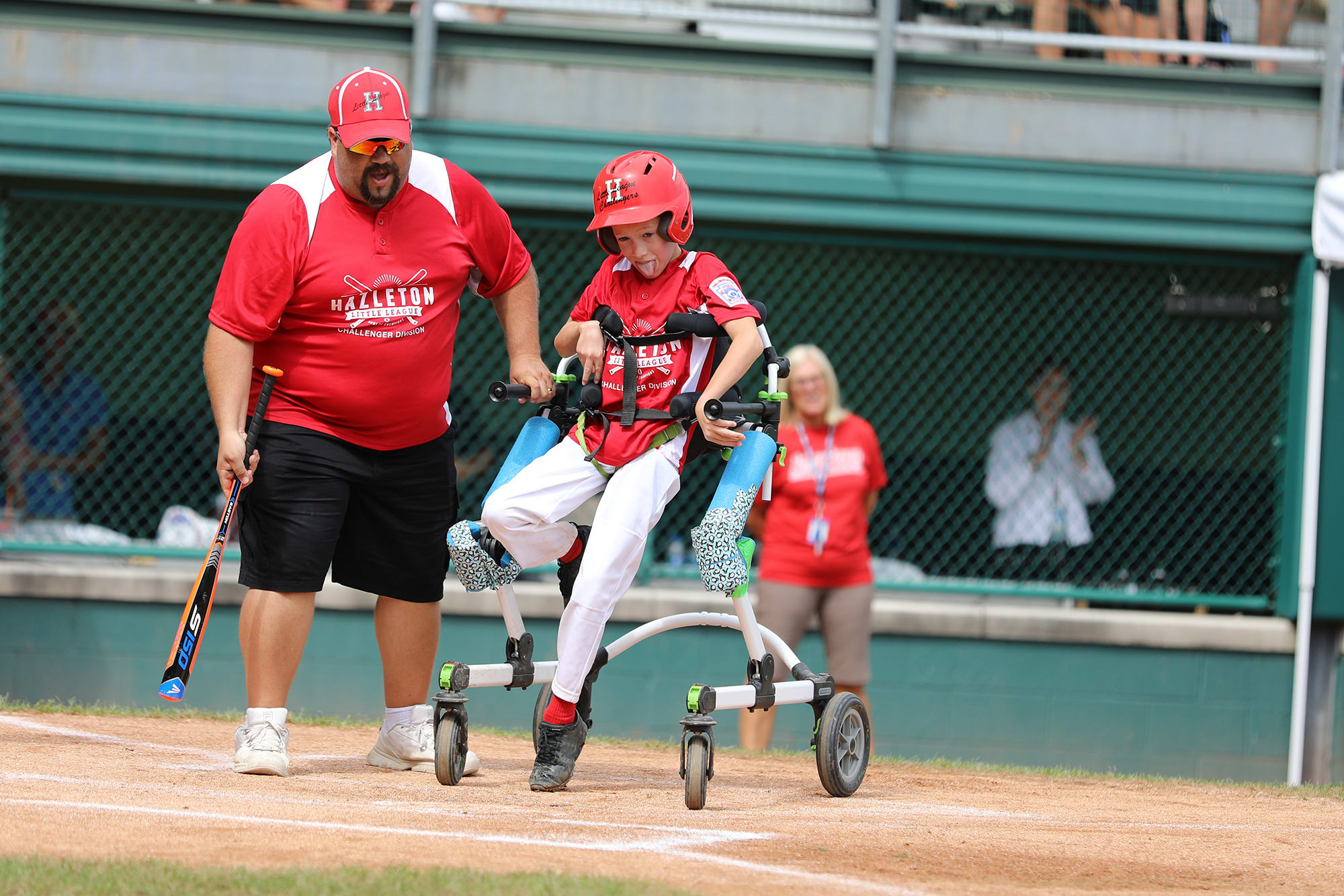 challenger game - player in wheelchair heading to first