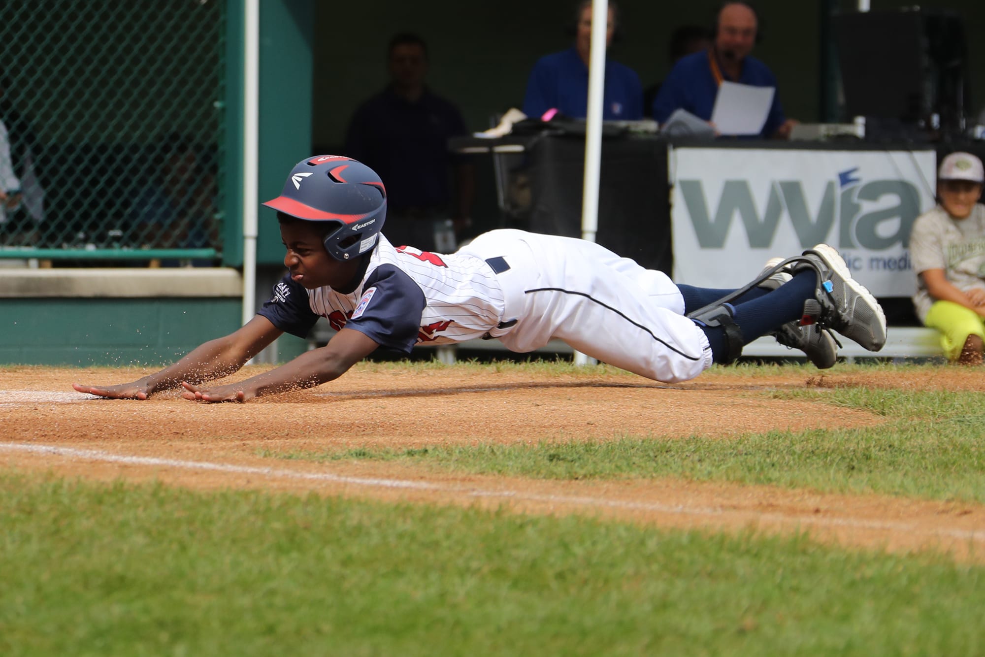 challenger game - player sliding into home