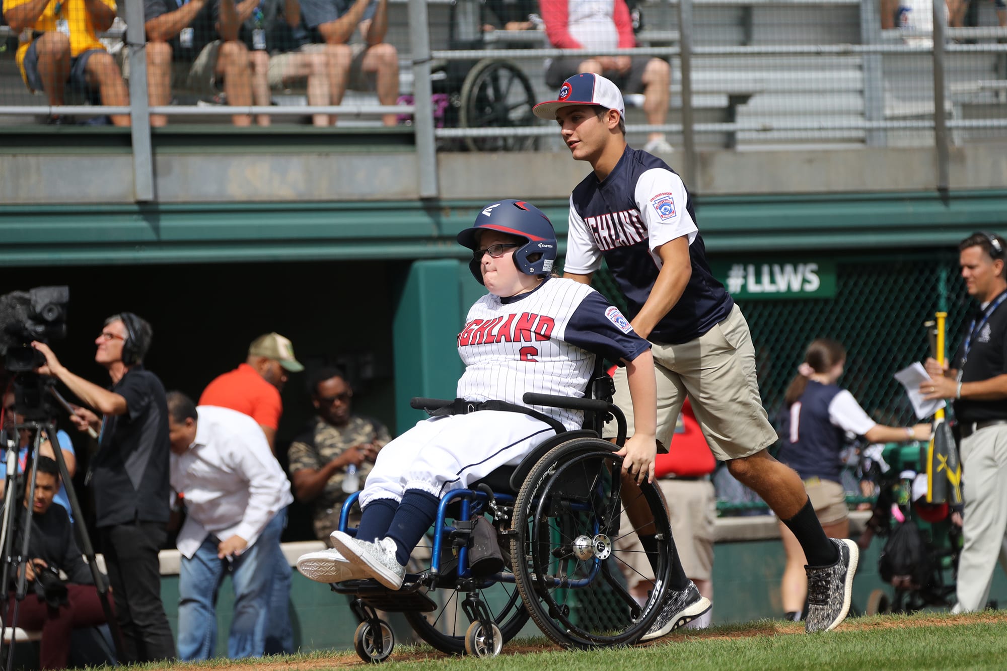 challenger game - player with wheelchair heading to home plate