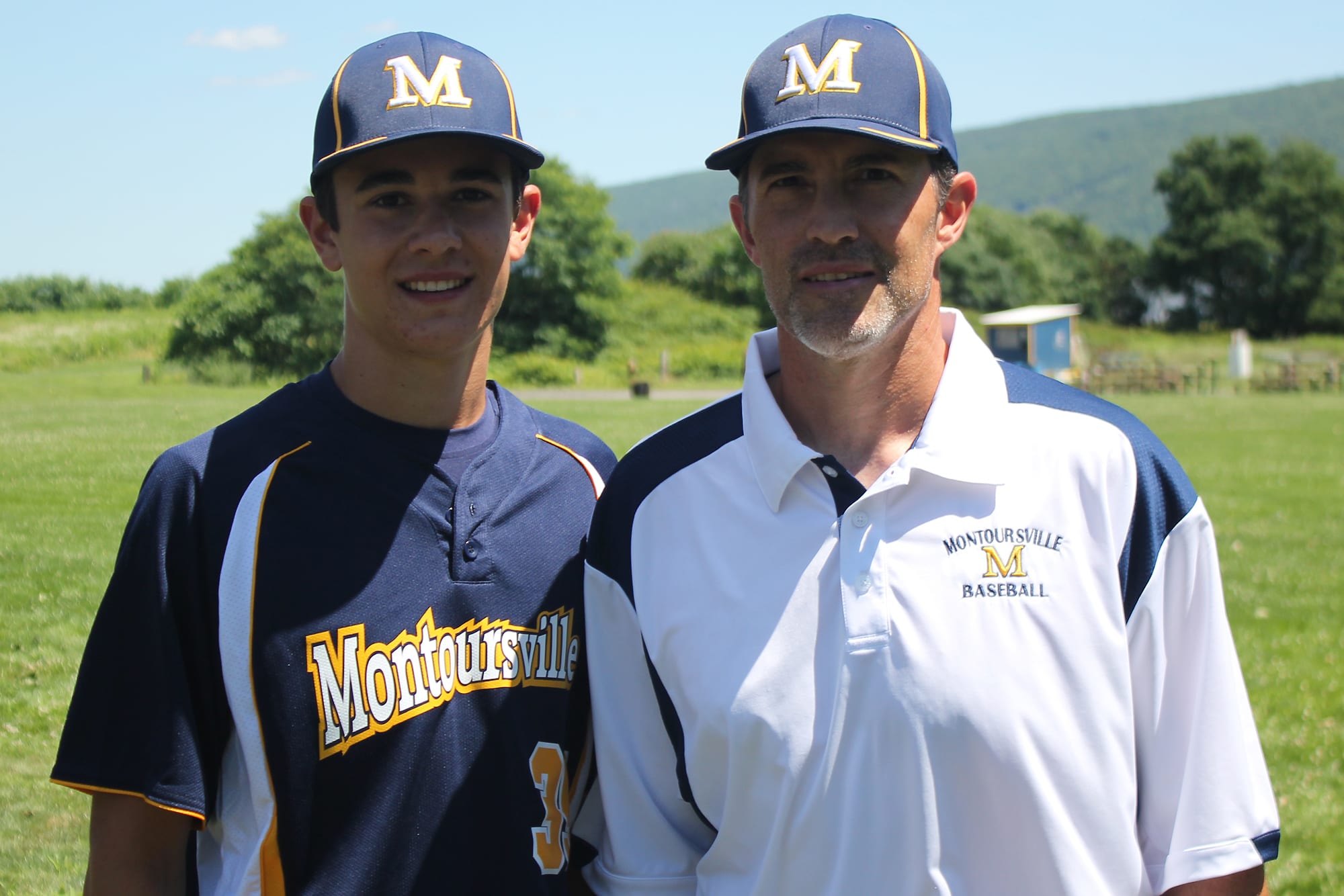 Mike Mussina and his oldest son, Brycen.