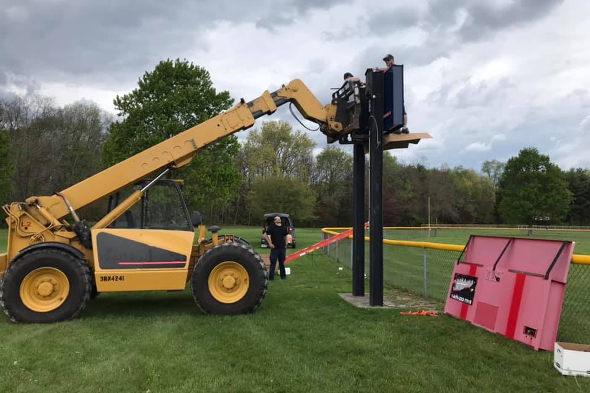 DeMotte LL scoreboards going up