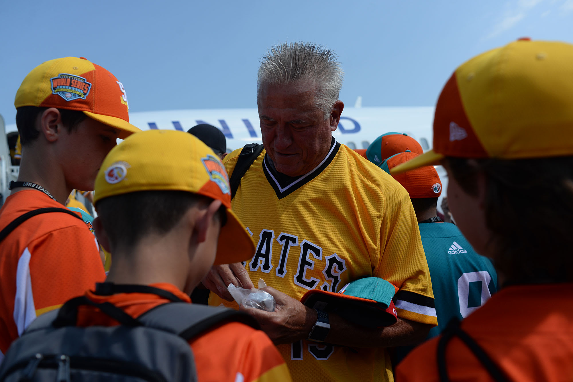 Clint Hurdle handing out pins to Southwest players