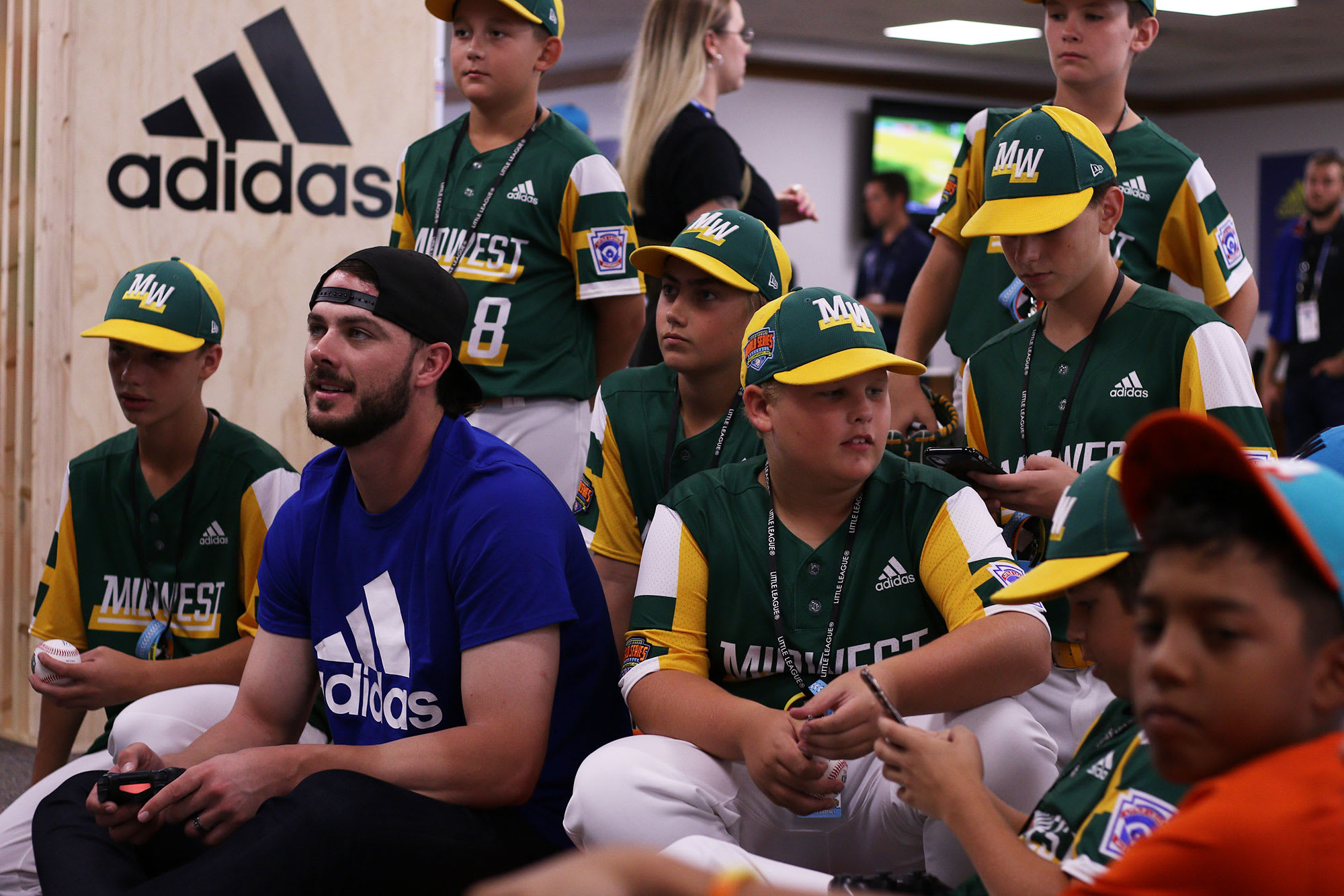 Cubs player playing video games with teams