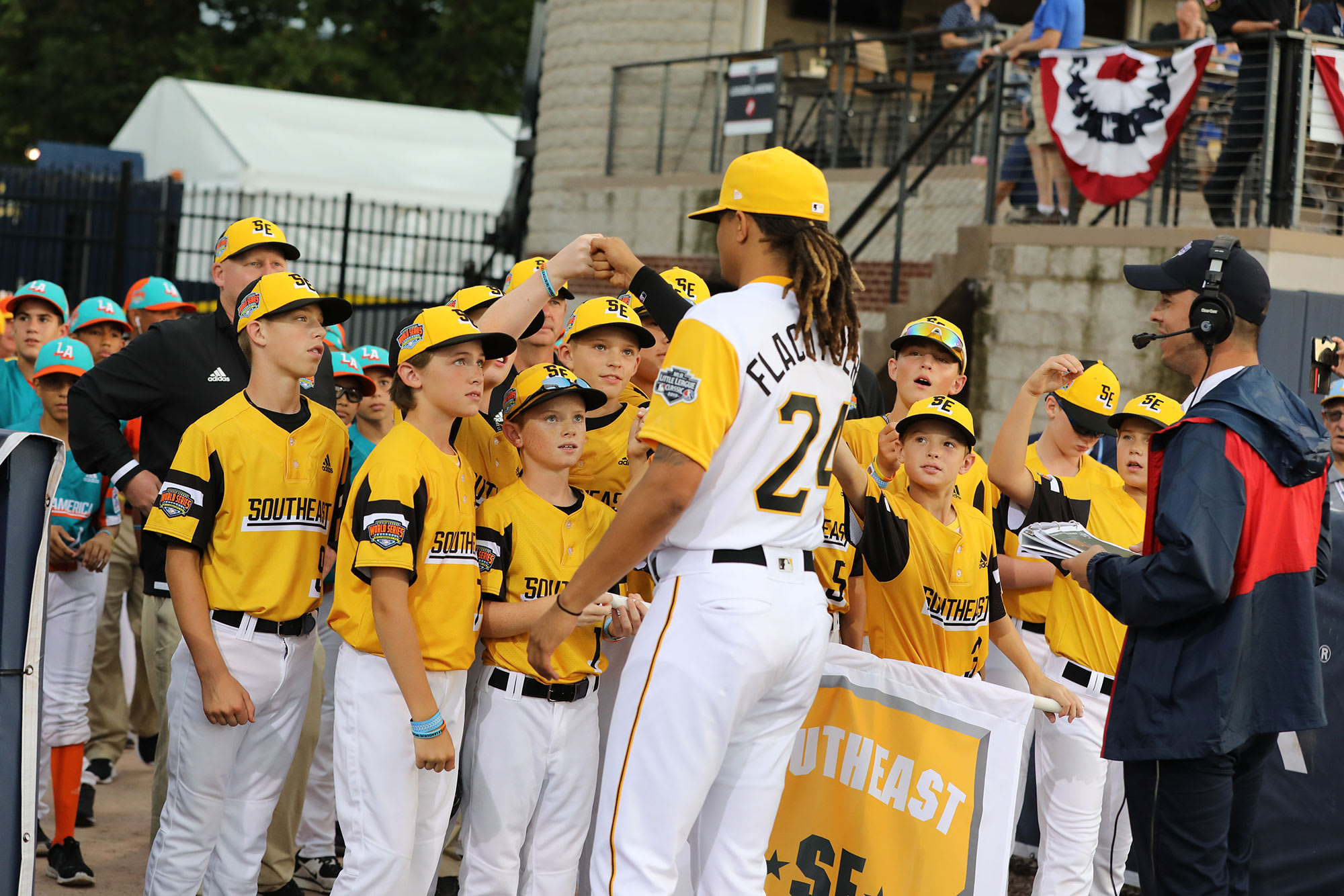 pirates player fist bumping se team mlb ll classic