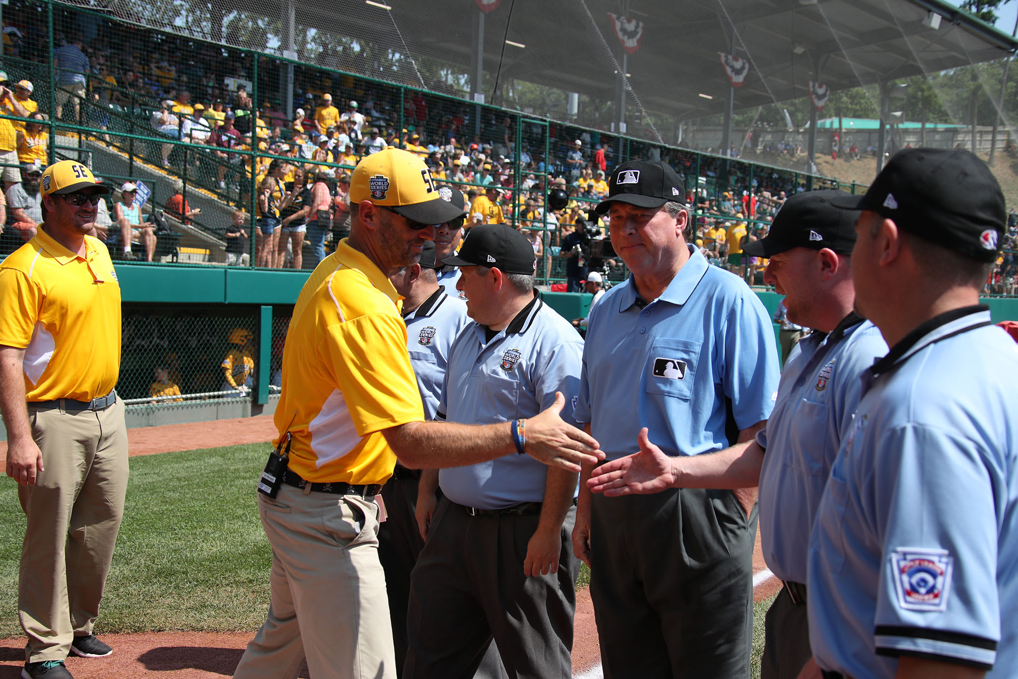 Umpiring crew brings 475 years of experience to Little League