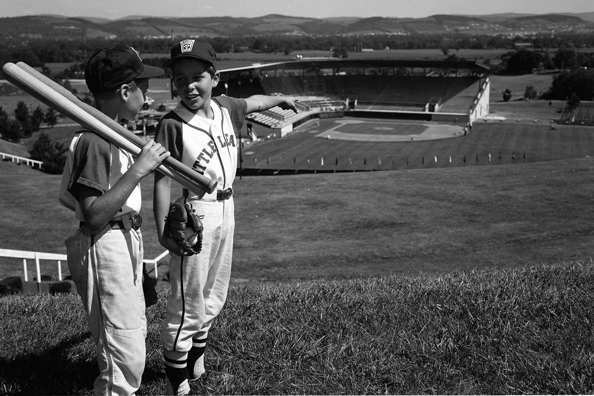 Honolulu, Hawaii celebrates by touching a bust of Howard J. Lamade that  sits in center field of Lamade Stadium after winning the Little League  World Series Championship baseball game against South Korea