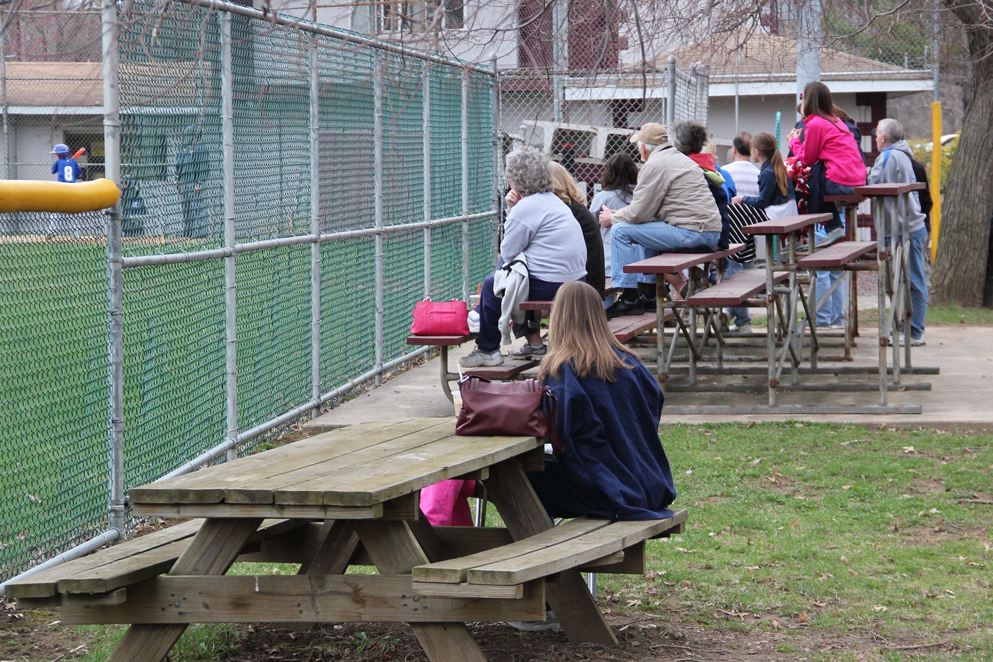 sports parents on bleachers