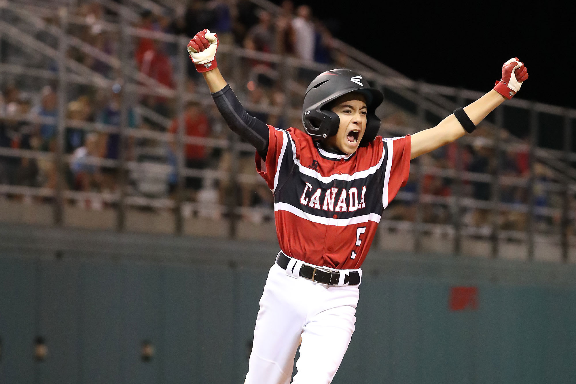 Canada runner scores game winning run