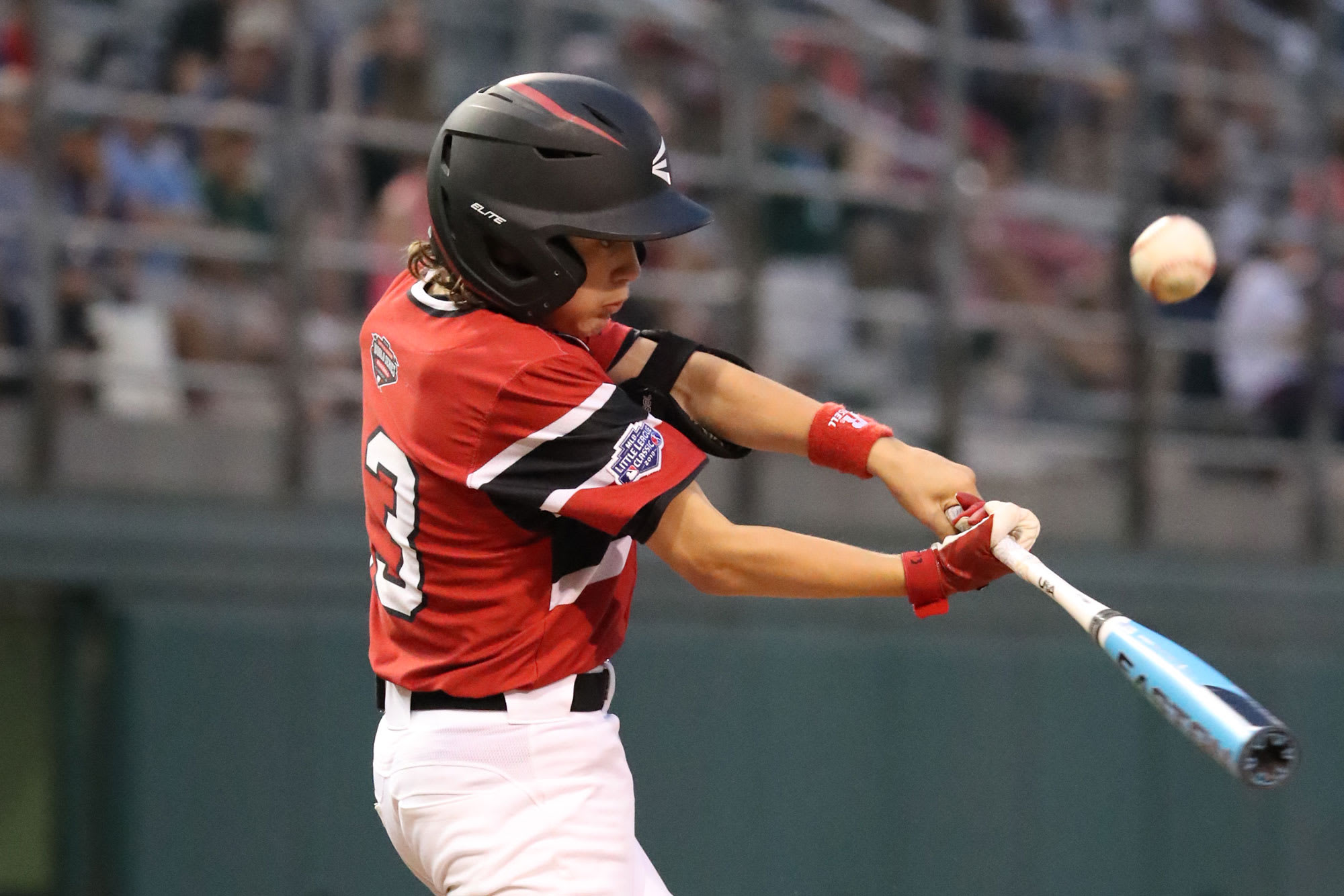 canada player hitting ball