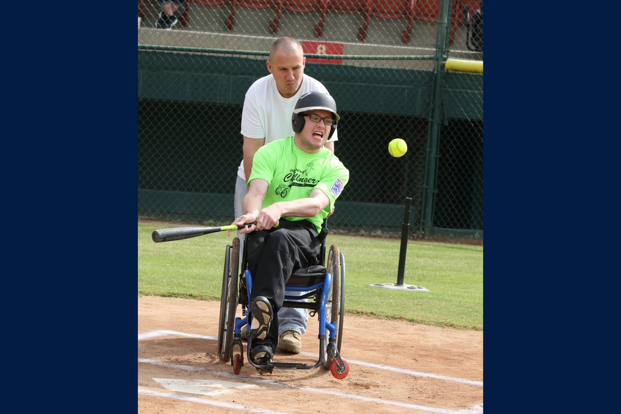 Challenger player with his buddy at the plate