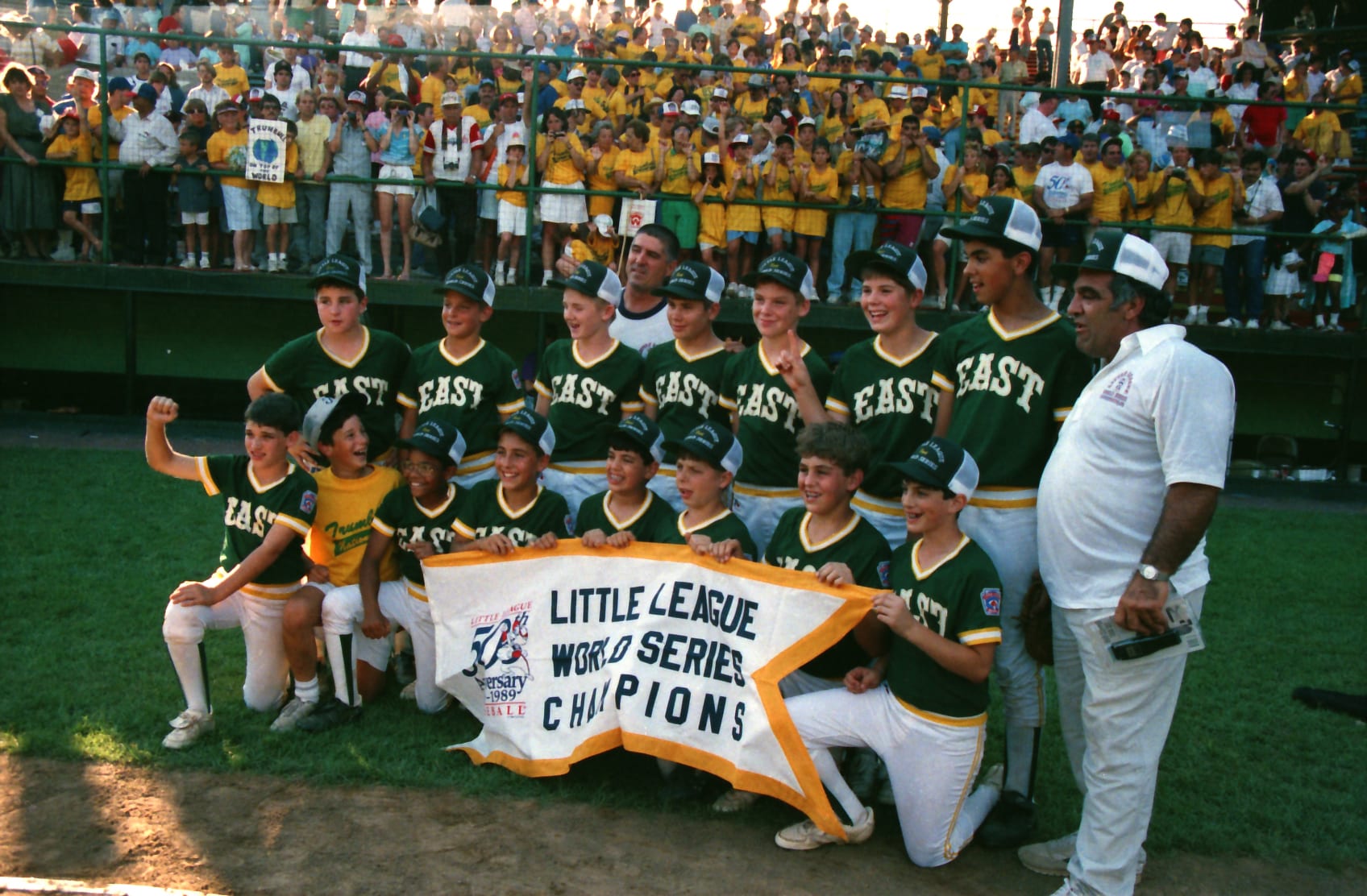 1989 Trumbull LL Team holds up the championship banner