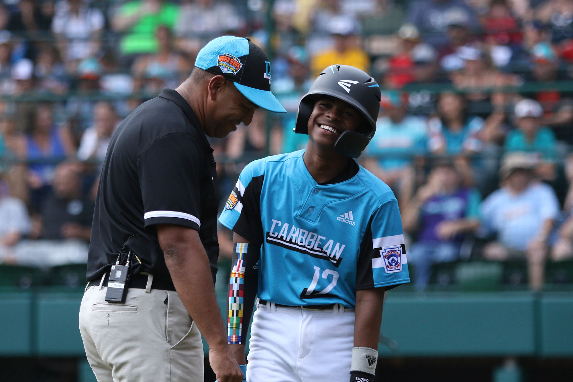 caribbean player and coach laughing