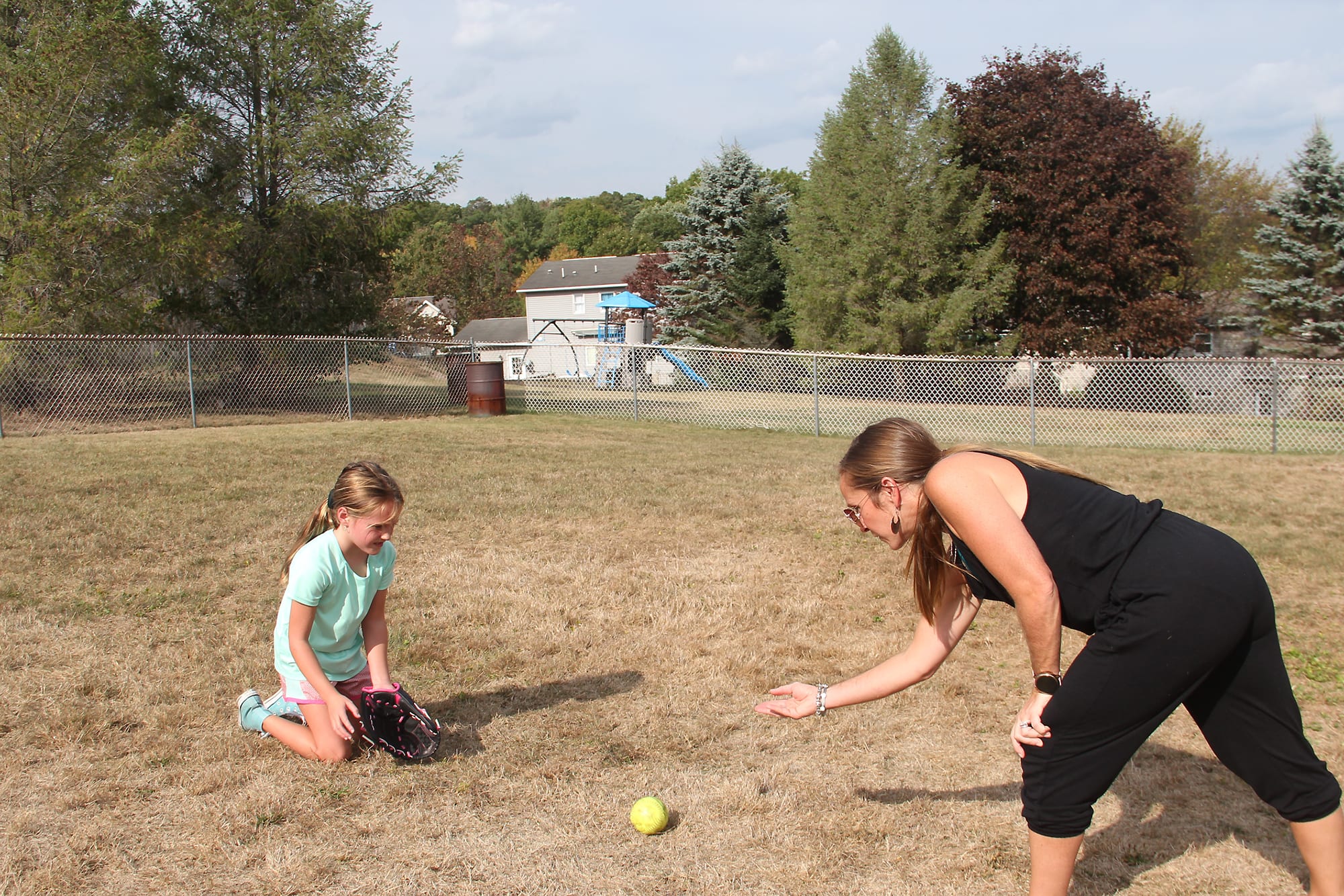 mother rolling ball