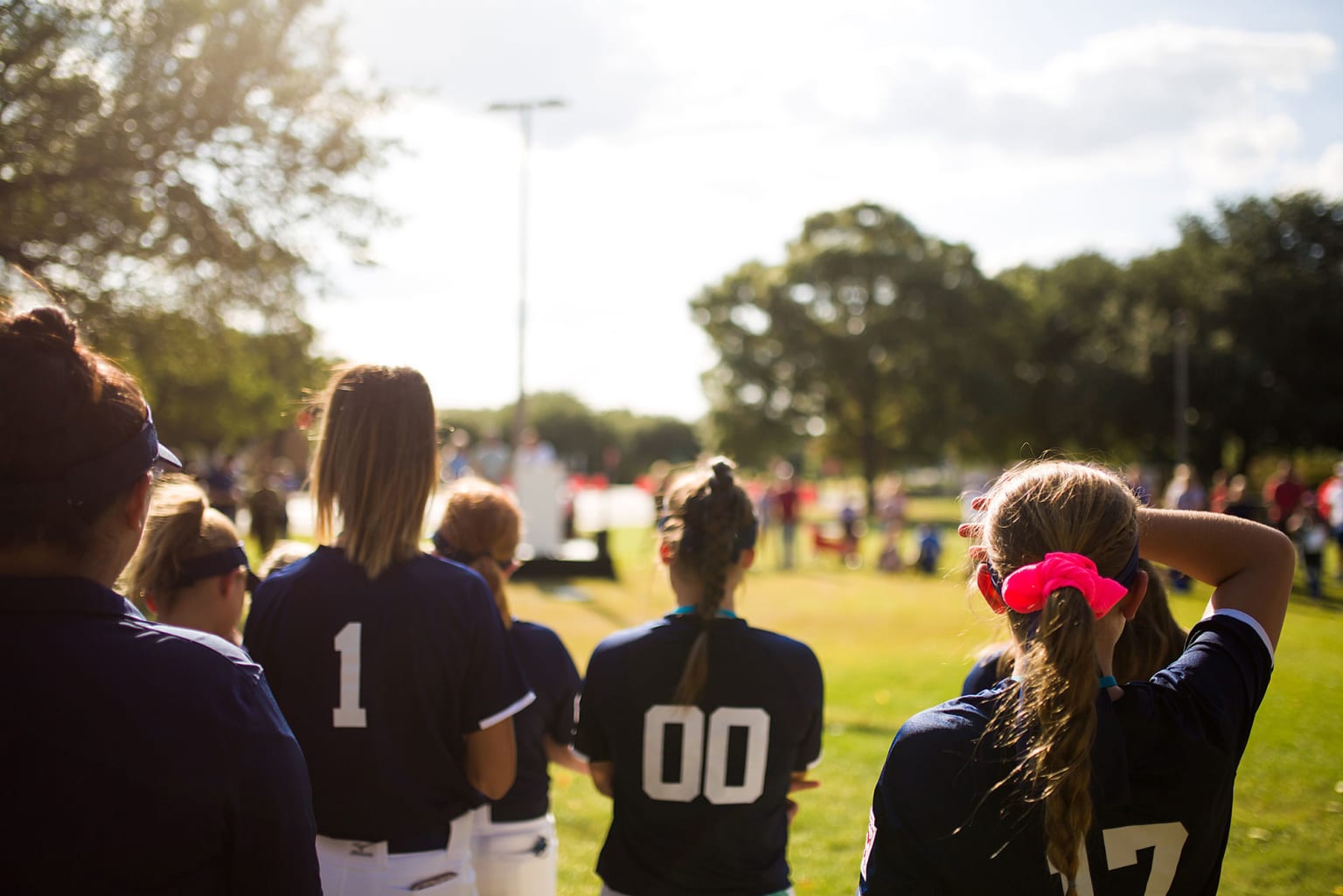 back of sb players standing