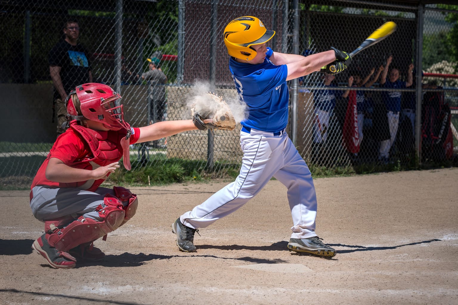 catcher-catching-ball-batter-swinging
