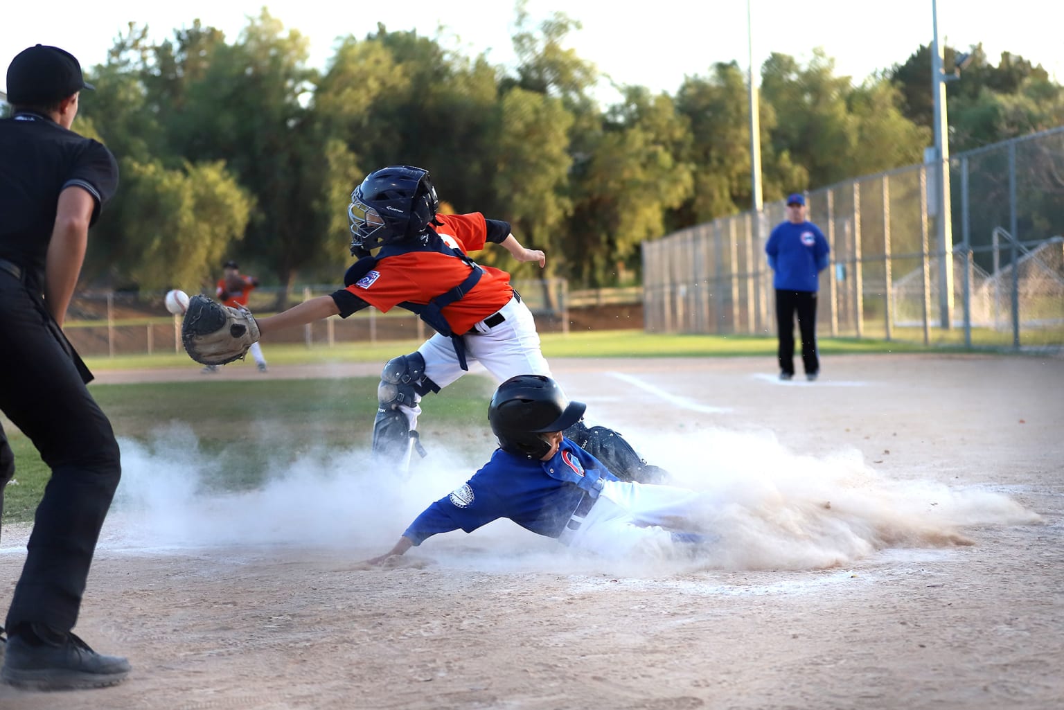 catcher-catching-ball-runner-sliding